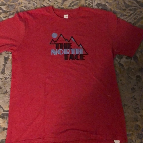 red north face shirt